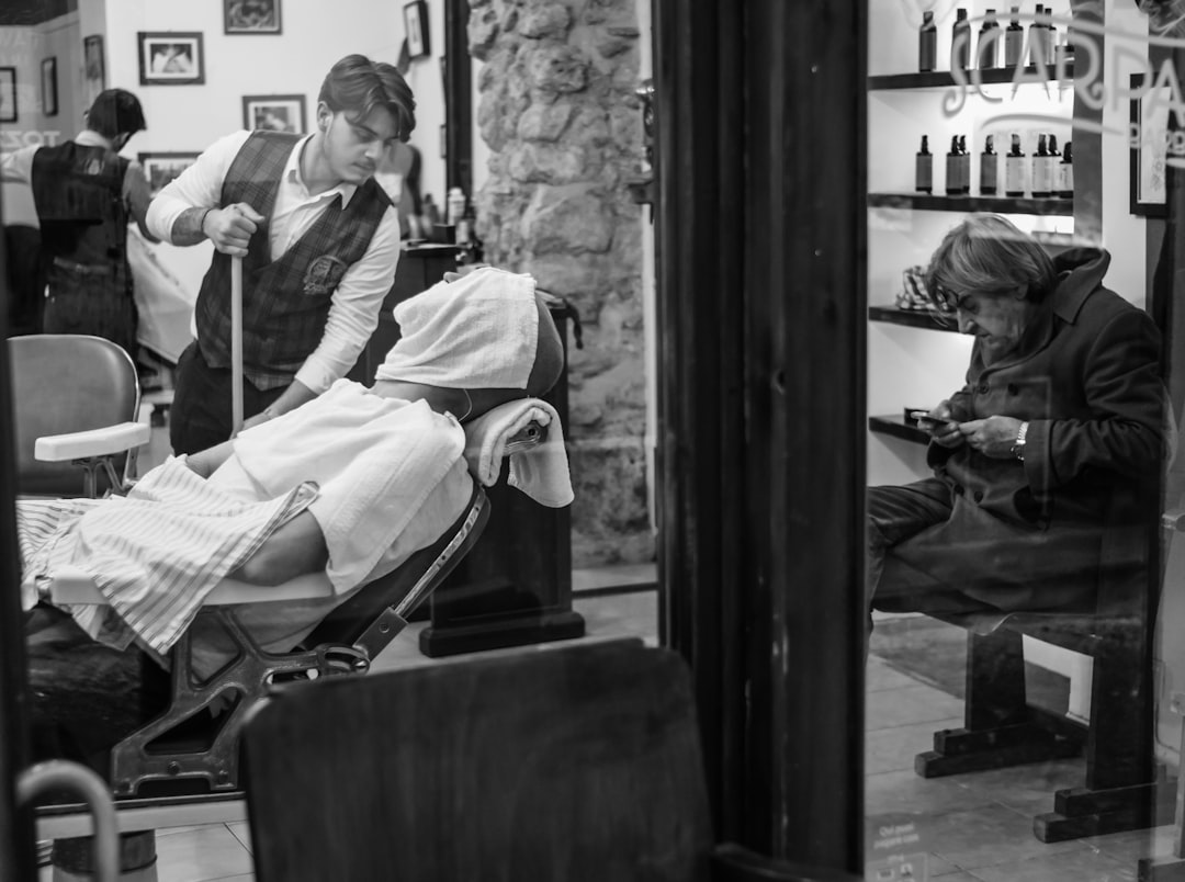 Barbers providing free haircuts at community event